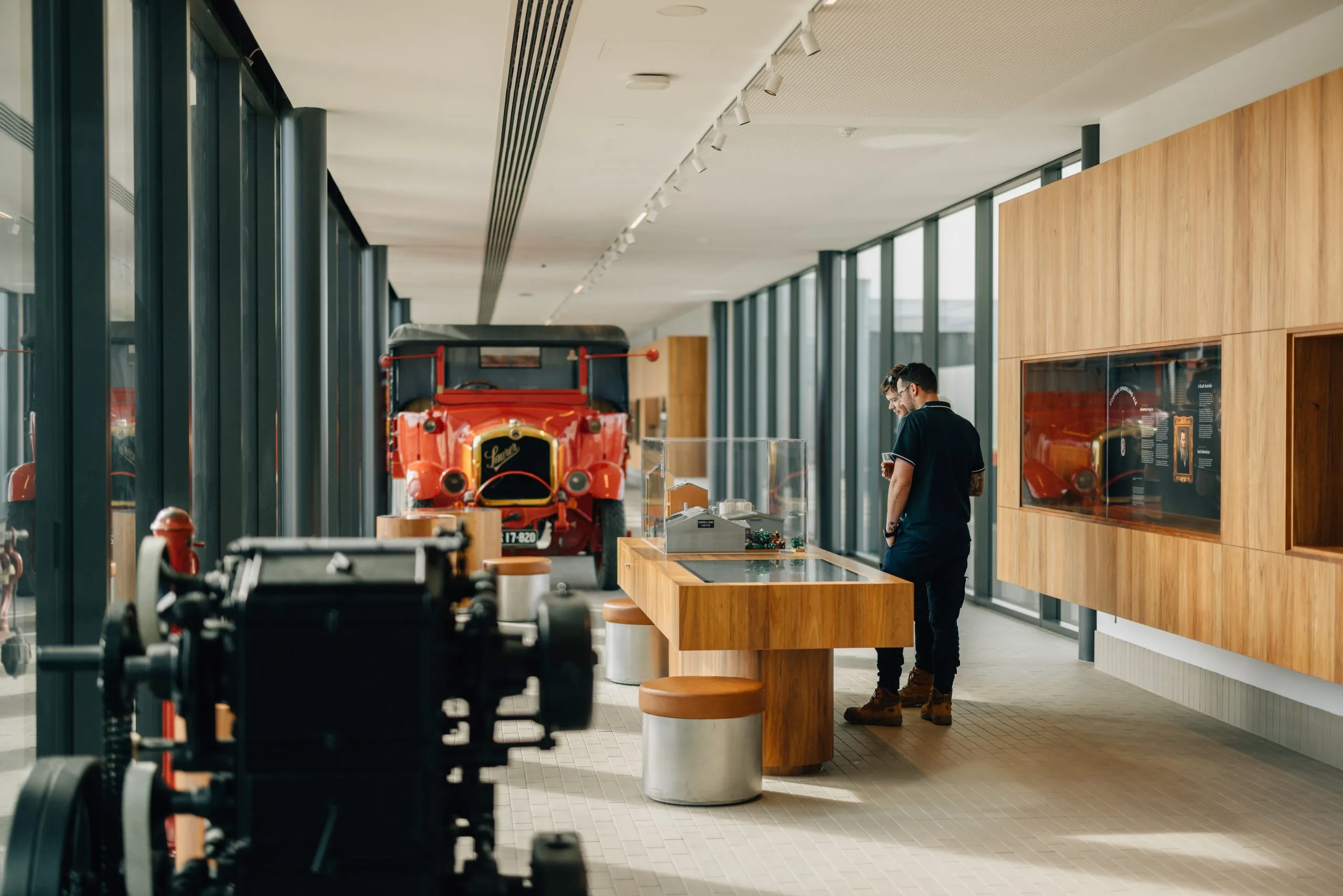 Visitors interacting with the Bottle Your Personality game at Coopers Brewery.