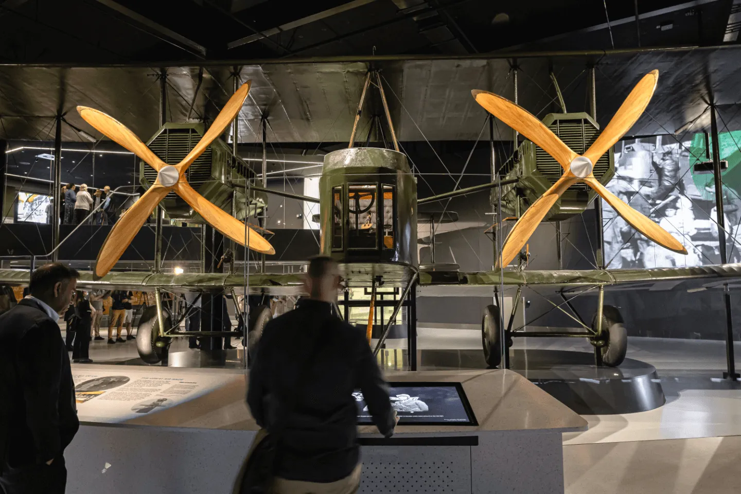 The Vickers Vimy aircraft on display with digital projection mapping in the background.